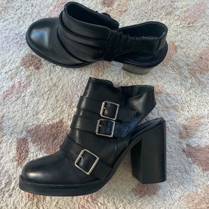 Jonak Paris black leather boots buckle cutout